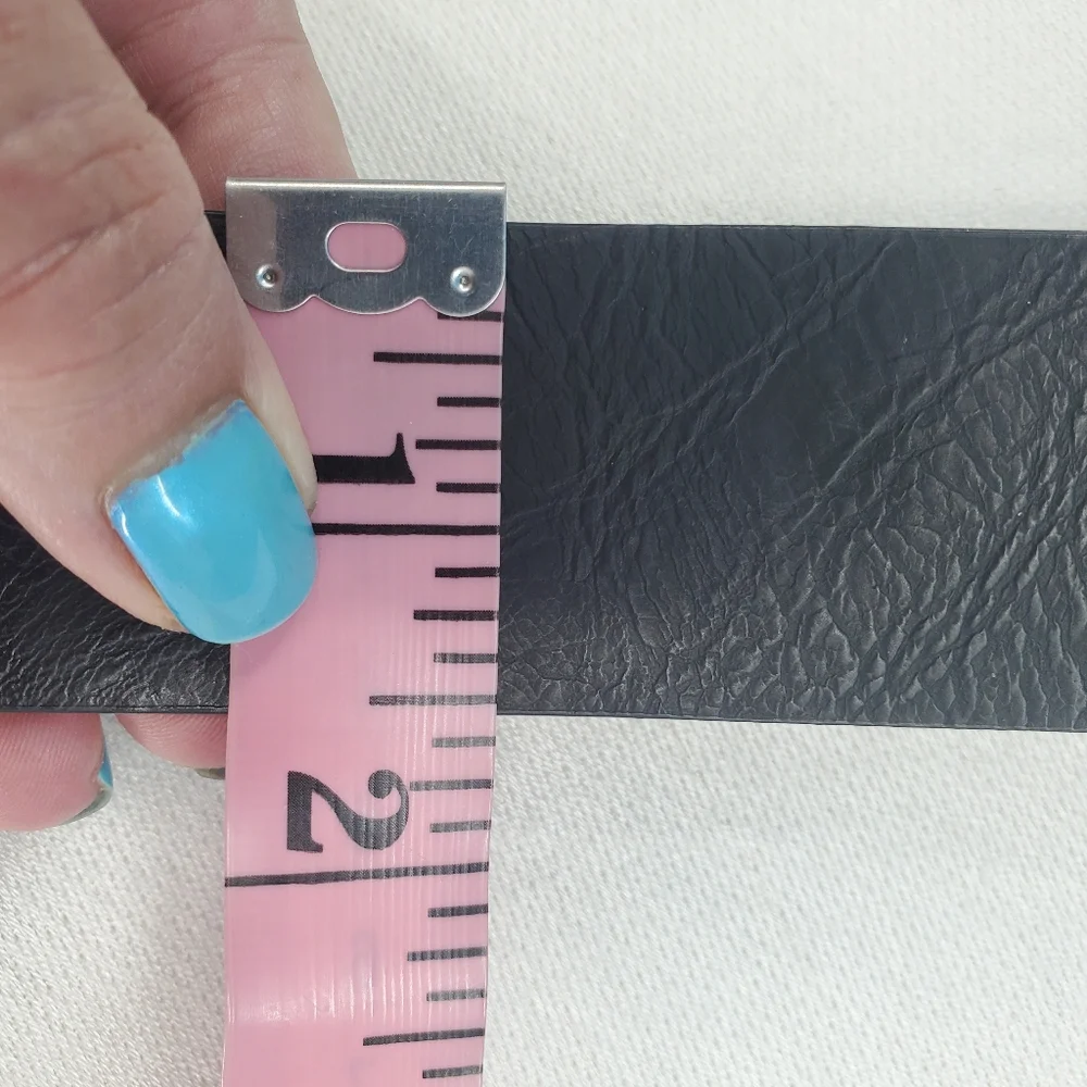 Black leather belt silver tone buckle